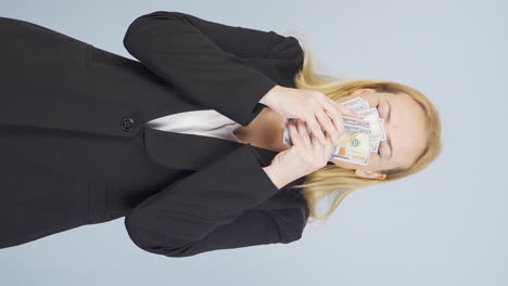 Vertical-video-of-Business-woman-who-loves-money.